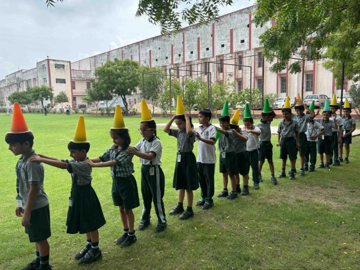 Grade 2 Students of Delhi World Public School Enthusiastically Participate in Cone Balancing Activity